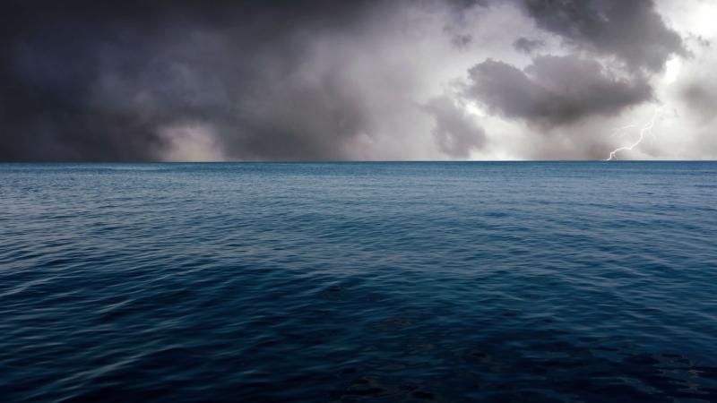 Subsurface ocean's influence on tropical cyclone formation Ocean surface with a storm in the background